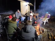 Clinton Russell, Samantha Russell, Herbie Jnr Russell, Stephenie Russell, Herb Snr Russell, Matt Raney, Misty Bilodeau & Marty Raney by the campfire at the Russell Family Homestead in Bedford, Pennsylvania.