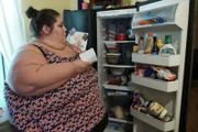 Alicia creating a grocery list.