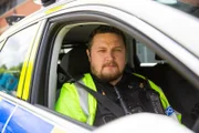 PC Ronnie Mitchell in ANPR car