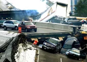 Cars sit on the collapsed Interstate 35W bridge on Wednesday August 1st, 2007.Cars sit on the collapsed Interstate 35W bridge on Wednesday August 1st, 2007.