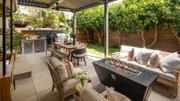 Mandy Moore, alongside Drew and Jonathan Scott, as they reveal the renovations of the outdoor patio area for Mandy’s longtime friend Celina.