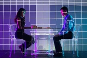 BURBANK, CALIF.- Go-Players at table in psychedelic setting. (Photo credit: Asylum Entertainment/Kurt Sayenga)