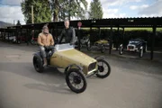 Tim and Fuzz pose with the restored Cannon "Goldfinger" at the reveal.