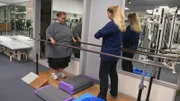 Tara working out with a personal trainer.