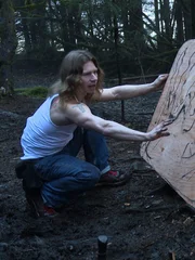 Bear Brown makes a sign.