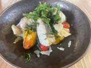 Zanderfilet mit wilden Gnocchi, Kirschtomaten, Rucola und gebratenen Walnüssen.