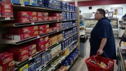 Beth shops at the grocery store