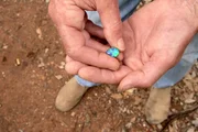 Opal in hand.