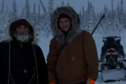 Heimo Korth and Krin Nelson are in the woods.