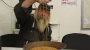 Tony Beets looks at the gold.