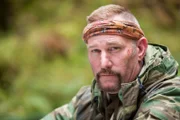 USA, Washington, Olympic National Forest, Portrait of Dave Canterbury in Pacific Northwest rainforest during Dual Survivor filming
