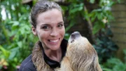How do sloths live upside down? A toe-toed sloth from Cincinnati Zoo called Mo with zookeeper Maura Messerly