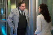 CHICAGO MED -- "Inheritance" Episode 115 -- Pictured: (l-r) Oliver Platt as Daniel Charles, Torrey DeVitto as Natalie Manning.