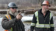 Tony Beets and Sheamus Christie looking at the dredge.