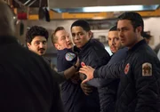 Pictured: (l-r) Yuri Sardarov as Otis, Christian Stolte as Mouch, Charlie Barnett as Peter Mills, Joe Minoso as Cruz, Taylor Kinney as Kelly Severide.
