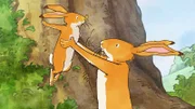 Der kleine und der große braune Hase freuen sich über den schönen Tag, den sie erlebt haben.