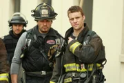 -- "A Hell Of A Ride" Episode 124 -- Pictured: (l-r) Joe Minoso as Cruz, Jesse Spencer as Matthew Casey.