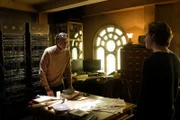 l-r: Dr. Howson (Alexander Siddig), Cassie (Laura Majid)