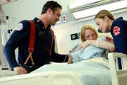 Pictured: (l-r) Taylor Kinney as Kelly Severide, Robyn Coffin as Cindy, Lauren German as Leslie Shay.