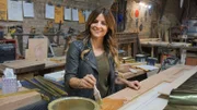 Host Alison Victoria applying brass to a custom front door.