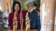 Esmeralda Zanders und Milton Hill bauen Miniaturschiffe.