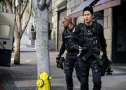 L-R: Sergeant Daniel 'Hondo' Harrelson (Shemar Moore), Officer Victor Tan (David Lim)