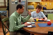 L-R: Alan Harper (Jon Cryer), Jake Harper (Angus T. Jones)