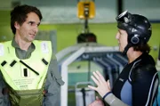 Todd Sampson is briefed by Leading Seaman Jan Gilmore while undergoing Helicopter Underwater Escape Training (HUET) at HMAS Albatross during filming for the documentary 'Redesigning the Brain'.