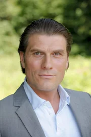 Frank W. Reidock (Lothar Kreilling).