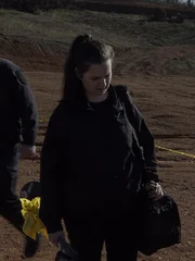 CSI and police officers at crime scene