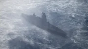Japanese battleship, Nagato, drifts across still waters near Bikini Atoll in mid-1946.