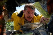 Brantford, Ontario - Firefighter Frank Kruppa sifts through the wreckage at the crash site of AIA Flight 808 in Guantanamo Bay, Cuba. He's heard voices coming from the remains of the DC-8 cockpit and searches frantically for survivors. Amazingly he finds that all three crew-members have survived the accident.