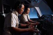 TORONTO - RE-ENACTMENT - The pilots become worried, F.O. Gunawan (played by Minh Le) and Captain Rozaq (played by Leon Aureus). (photo credit:  Cineflix/Steven Lungley)