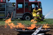 Brantford, Ontario - Firefighter Frank Kruppa (played by David Macinnis, left) and a trainee firefighter are the first to arrive at the crash site of AIA Flight 808 in Guantanamo Bay, Cuba. The DC-8 cargo flight crashed near the Naval Base in August 1993 following a flight from Norfolk Virginia.