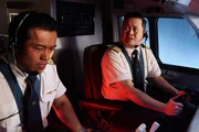 TORONTO - RE-ENACTMENT - The pilots become worried, F.O. Gunawan (played by Minh Le) and Captain Rozaq (played by Leon Aureus).