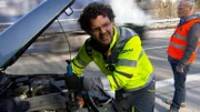 The ADAC breakdown service, looking after a broken down car.