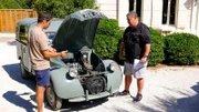 MIKE AND ELVIS LOOKING AT ENGINE
