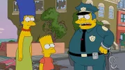 Steckt Bart (M.) hinter der Bulldozer-Attacke auf die Stadt oder nicht? Chief Wiggum (r.) ist - genau wie Mama Marge (l.) - einfach ratlos ...