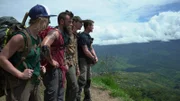 Wide hero shot of (L-R) Sam, Parker, Fred, Karla overlooking the landscape of PNG – side facing