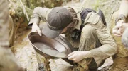 Mid shot of Parker panning at Edie Creek