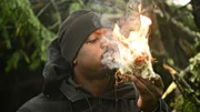 Hakim starting a fire