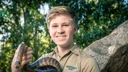 Robert Irwin with snake.