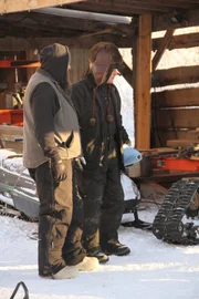 Clint Greathouse and Todd Anderson plan how to turn the Geo Tracker into an all-terrain vehicle.