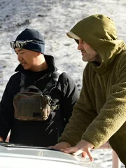 Ed Stafford having a briefing with Teddy