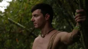 Cory holds a stick.
