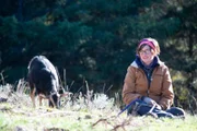 Rain Brown outside her home with some ranch residents.