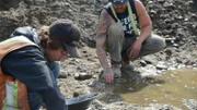 Parker Schnabel and Rick Ness gold panning.