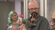 Jackson holding a kittens next to Samantha.