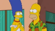 Marge (l.) hat Homer (r.) losgeschickt, eine neue Waschmaschine zu kaufen. Doch dieser kommt mit einem Grill-Smoker zurück. Was zu Beginn für Ärger zwischen dem Ehepaar sorgt, endet dann im Fernseh-Koch-Duell "Fresskalaktion" mit Scotty Boom ...