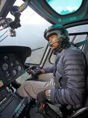 Simrik Air pilot Surrendra Poudel flies his helicopter on a rescue mission over Everest Base Camp, Nepal.